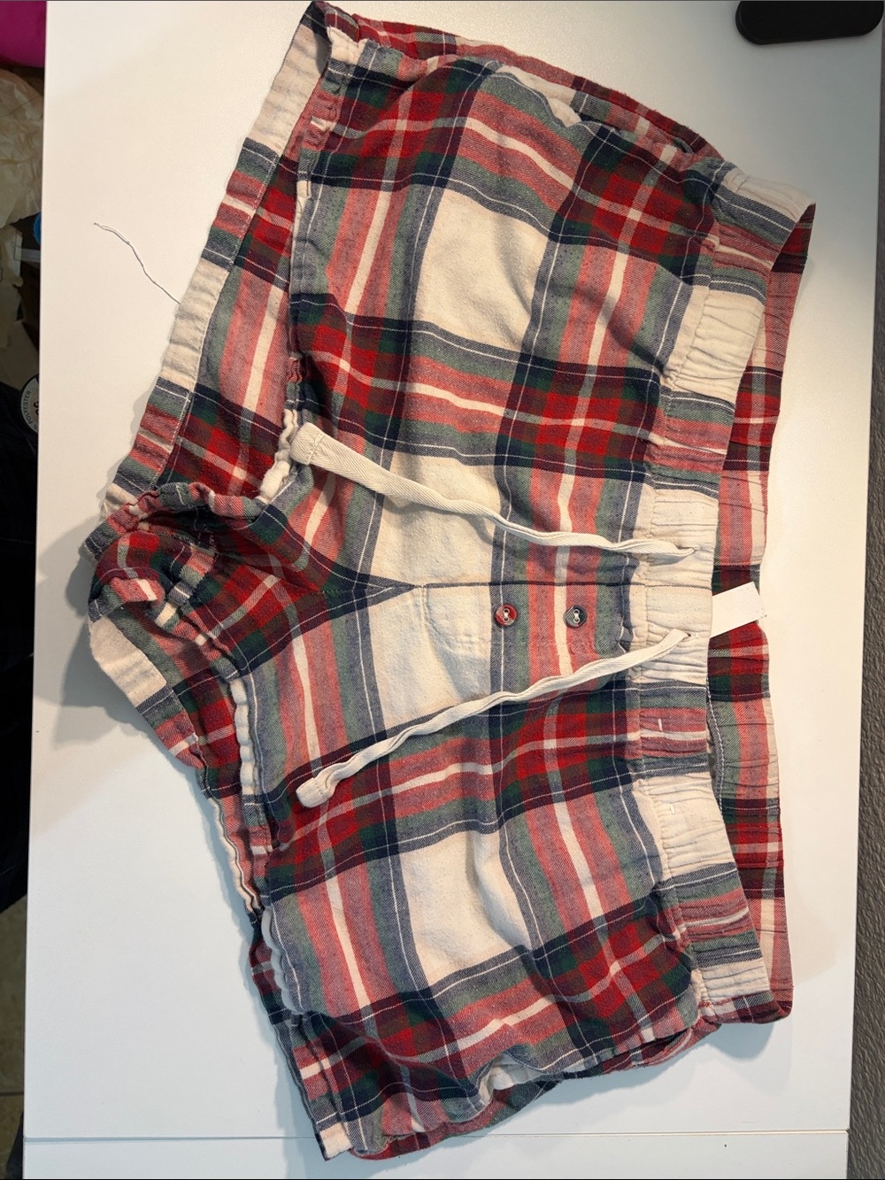 stars above Plaid Drawstring Shorts in Red, Green & Cream